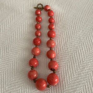 Large Beaded Coral Necklace with a Bronze Clasp.